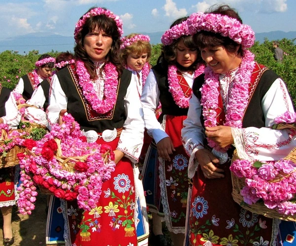 a group of women wearing flowers